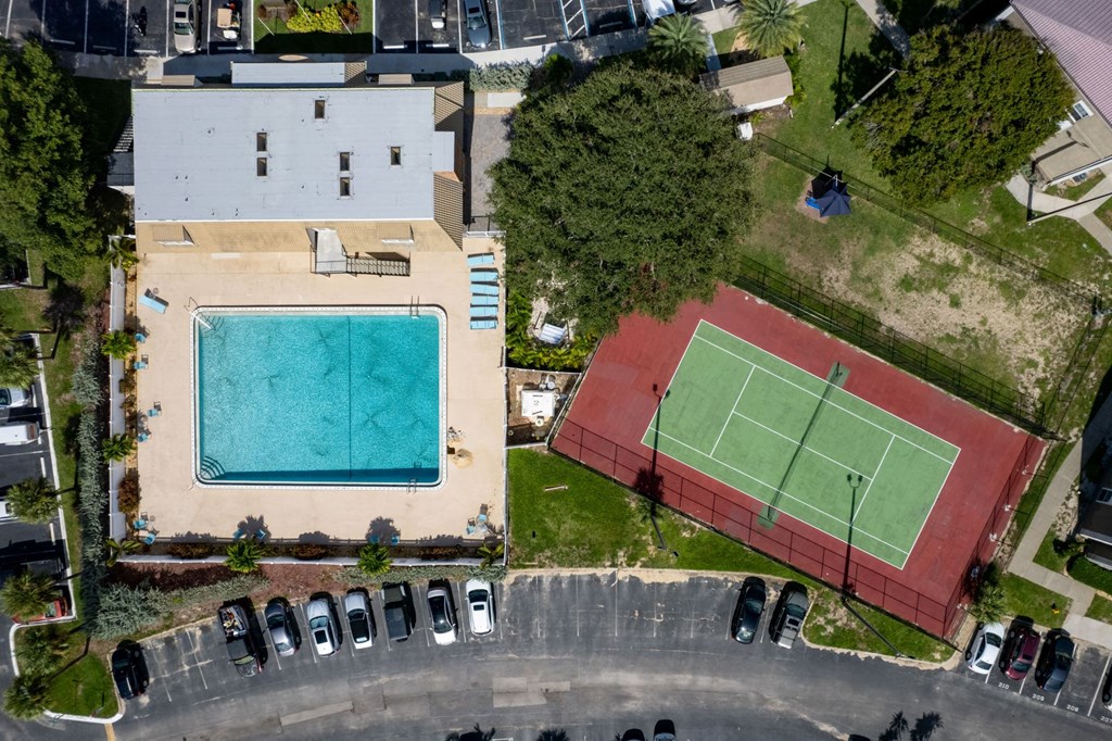 Enjoy tennis or the pool at The Brittany, Indialantic, FL