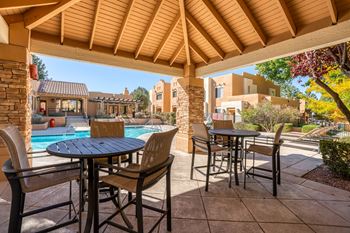 Poolside Gazebo with high top tables and chairs at Vizcaya, Santa Fe, 87505