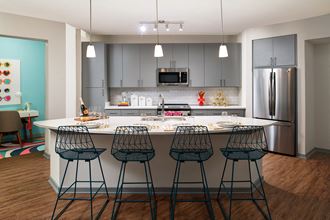 Kitchen with island  | District at Rosemary - Photo Gallery 3