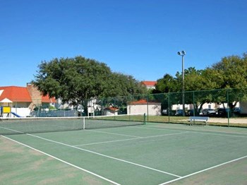 Challenge friends to a match on the community tennis court |Brittany