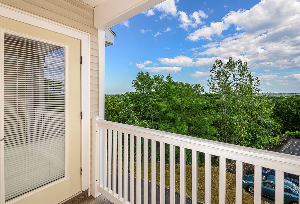 Homes feature private patios or balconies at Highlands at Faxon Woods, Quincy, Massachusetts