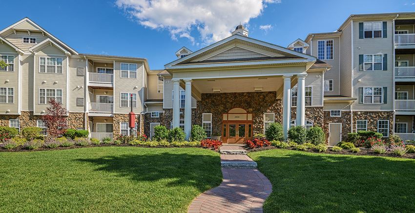 Entrance to clubhouse and leasing office Entrance to clubhouse and leasing office | Highlands at Faxon Woods - Photo Gallery