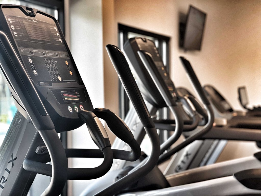 a row of cardio machines in a gym at 2300 West Apartments, Reno