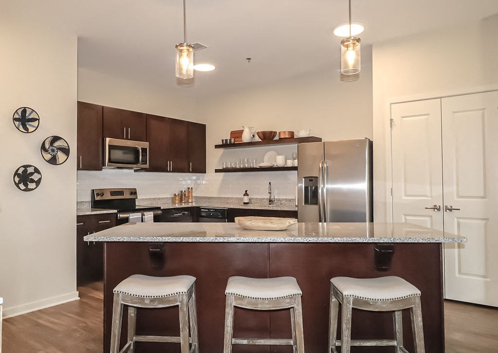 Kitchen with island seating  at The Station at River Crossing, Macon