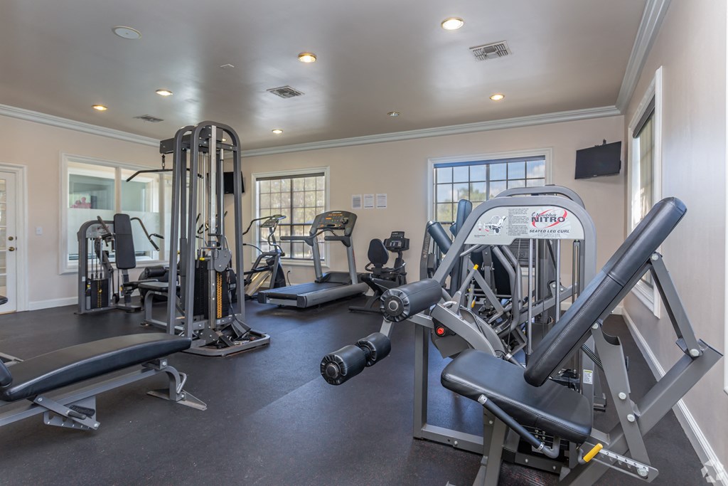 the gym at the whispering winds apartments in pearland, tx  at Bay Harbor, Fort Myers, Florida