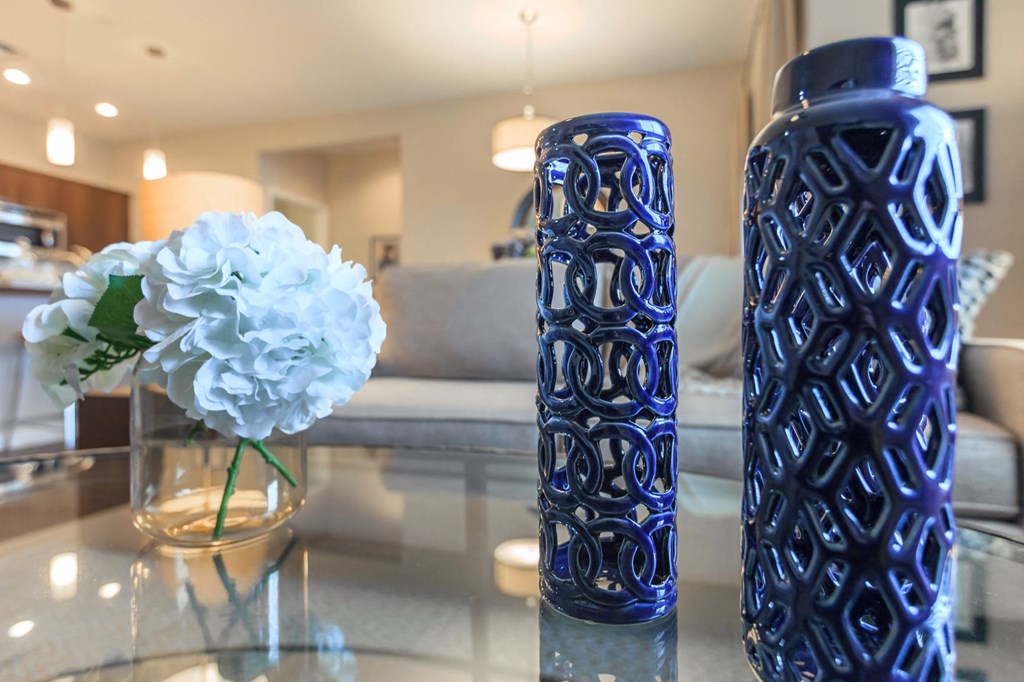 vases and flowers on coffee table at The Canyons at Linda Vista Trail, Oro Valley, Arizona
