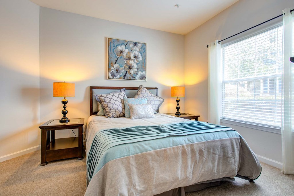 Bedroom | Thornberry Apartments a bedroom with a bed and a large window at Thornberry Apartments, North Carolina, 28262