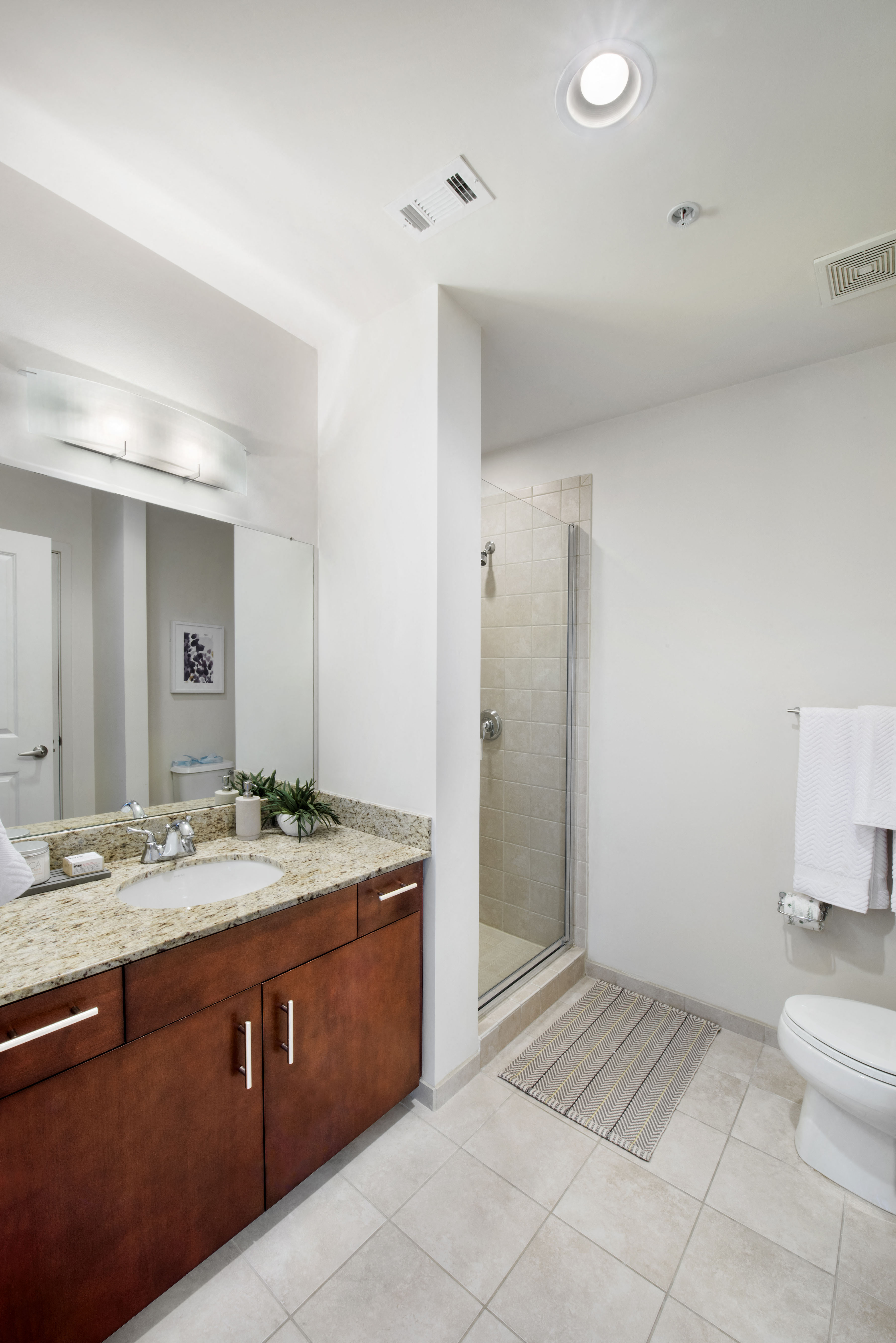 a bathroom with a toilet sink and shower at Element, Tampa, FL, 33602