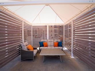 interior of pool cabana with seating and table - Photo Gallery 4