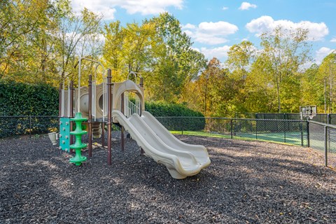Playground at a park with a slide at Thornberry Apartments, Charlotte, 28262