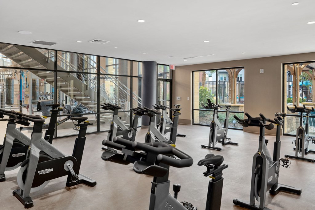 Two story fitness club with spin bikes at Inspire, Charlotte, North Carolina