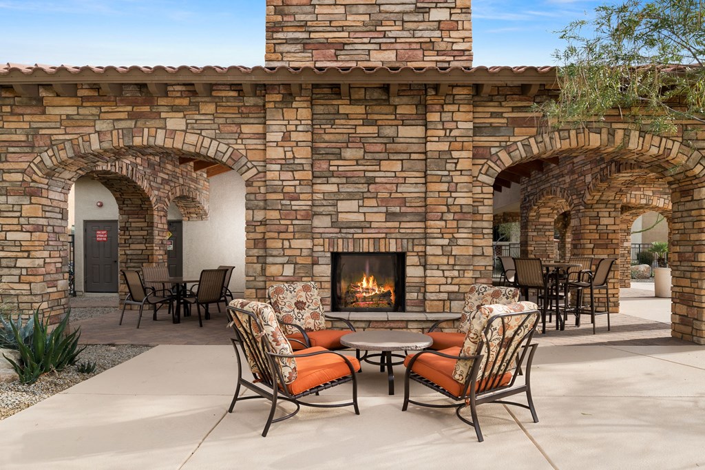 Outdoor fireplace and lounge area at Villas at San Dorado, Arizona