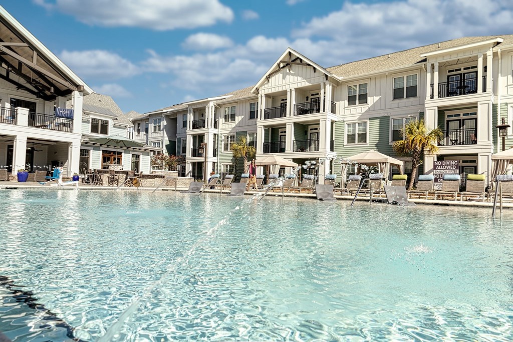A large swimming pool in front of a resort at Wharf 7 Apartments, Charleston
