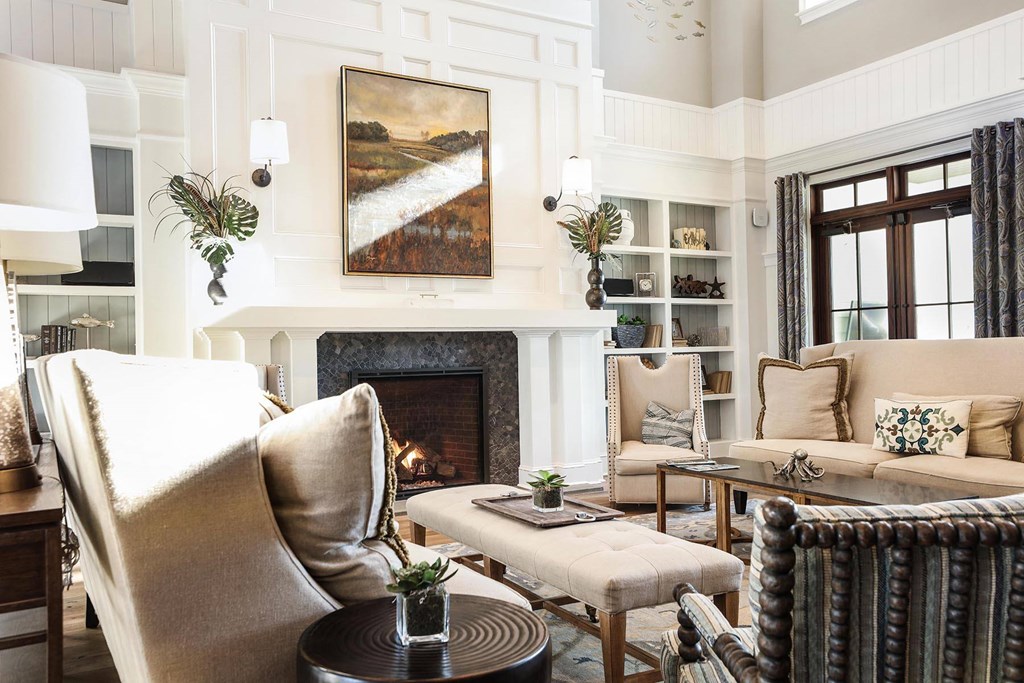 A cozy living room with a fireplace and comfortable seating at Wharf 7 Apartments, South Carolina