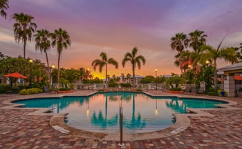 Enjoy gorgeous sunset views at the community pool Dusk view of community pool | Promenade at Reflection Lakes - Photo Gallery 2
