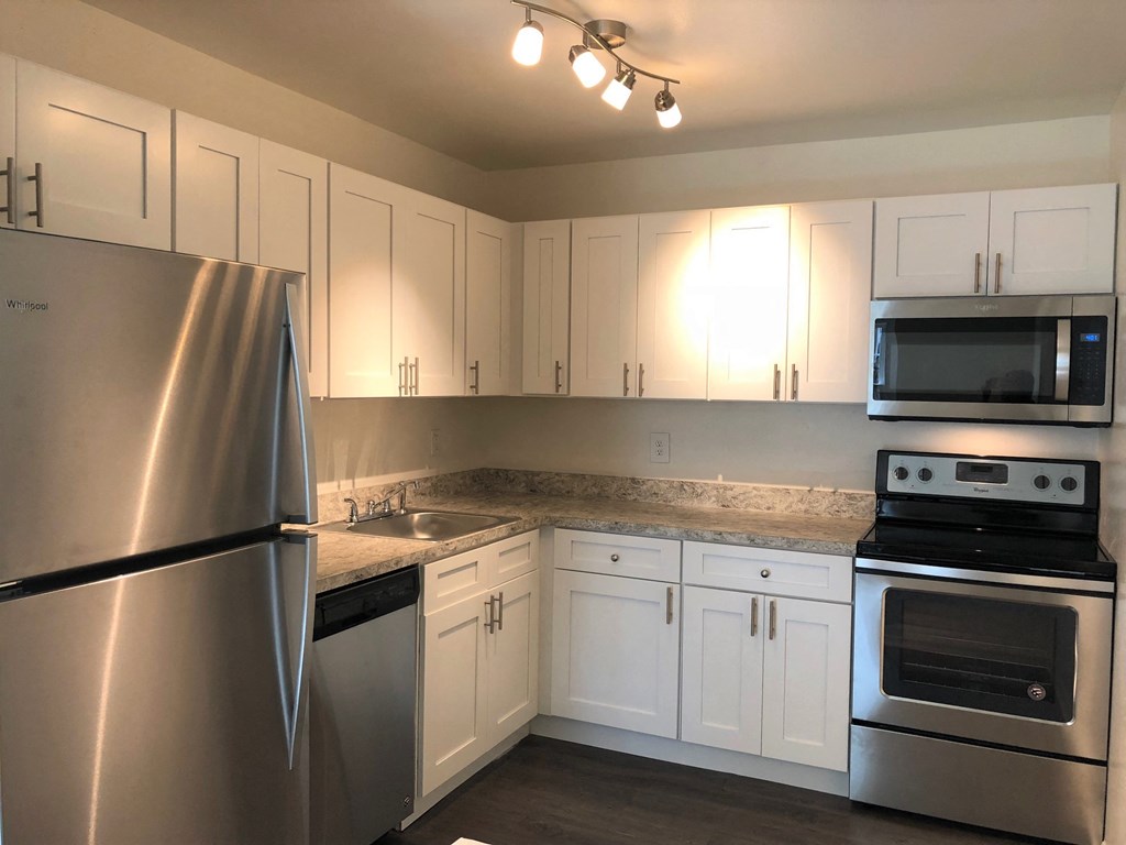 Kitchen with stainless steel appliances  at The Brittany, Florida