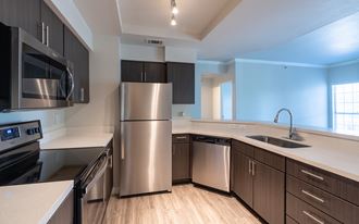 Kitchen with stainless steel appliances | Sedona Springs