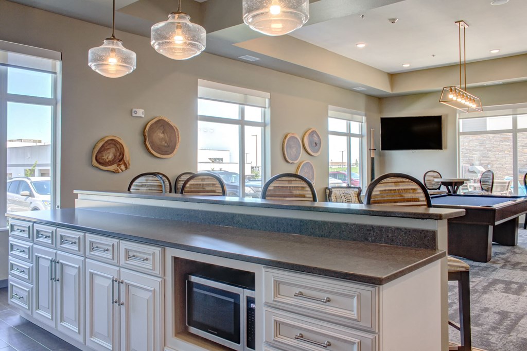 Clubhouse with kitchen areaat SoRoc On Maine, Rochester Minnesota   