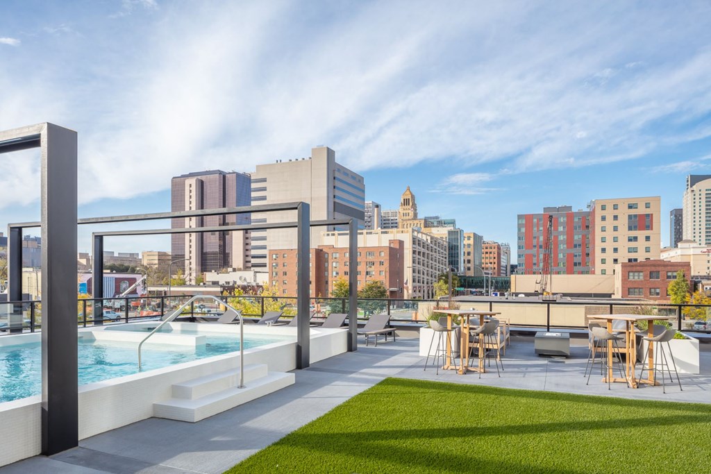 a field of grass in front of a building at Maven on Broadway, Rochester, Minnesota