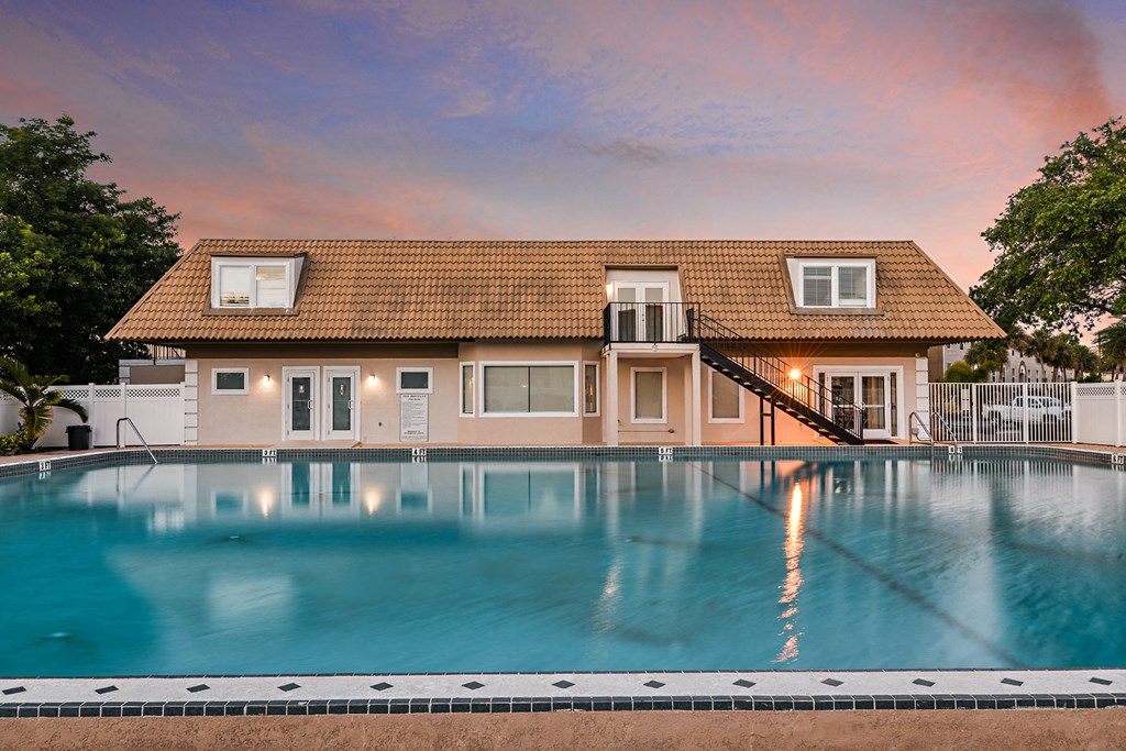 Take in sunsets by the community pool at The Brittany, Indialantic, FL