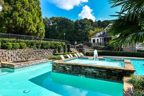 a pool with a fountain at 670 Thornton, Lithia Springs, Georgia