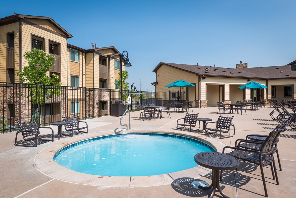 our resort style swimming pool is in the courtyard of our apartments at Estate at Woodmen Ridge, Colorado Springs, CO