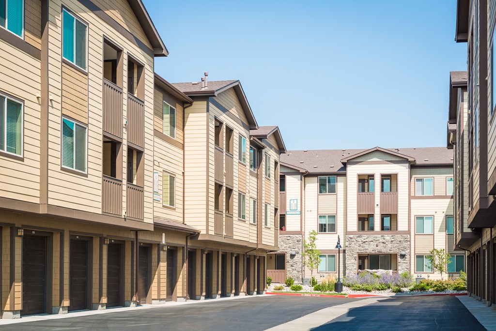 an empty street in front of an apartment buildingat Estate at Woodmen Ridge, Colorado, 80923