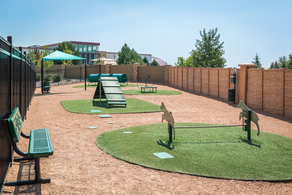 a dog park with agility equipment at Estate at Woodmen Ridge, Colorado