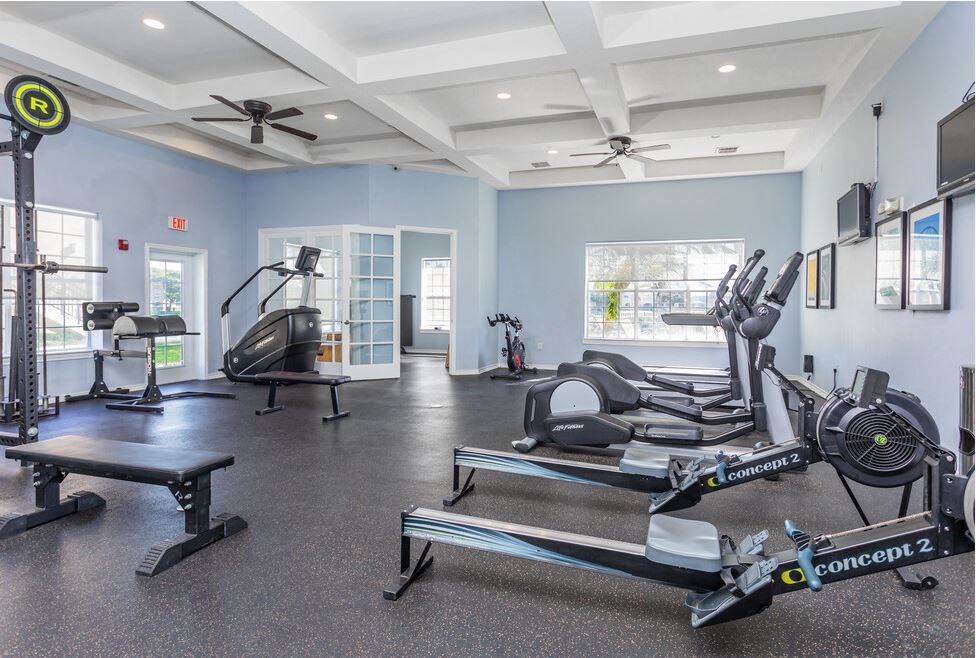 Fitness center with cardio machines at Cypress Legends, Fort Myers, FL