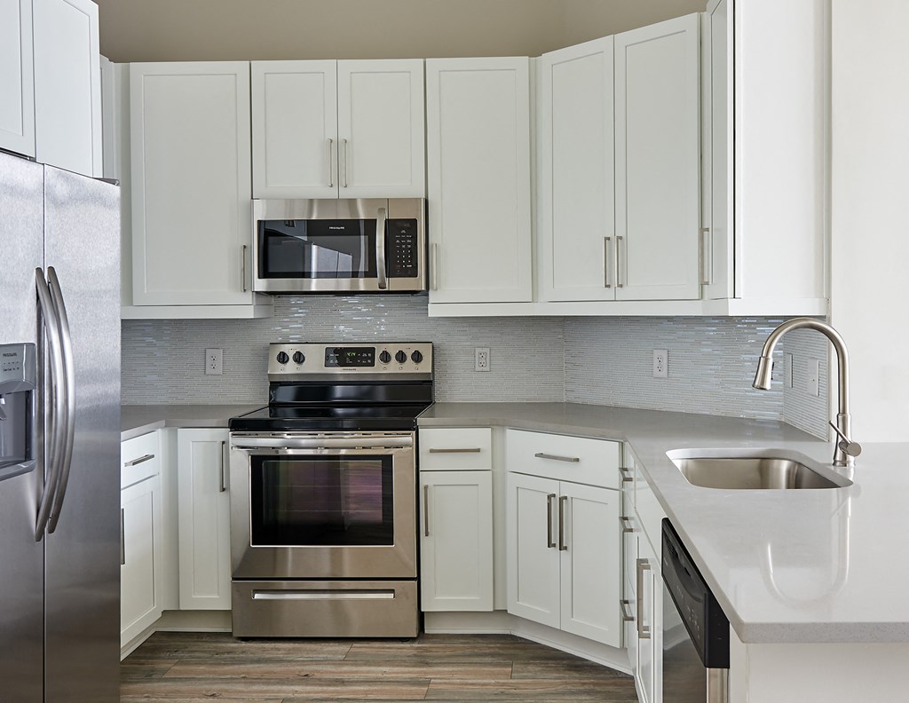 Kitchen with stainless steel appliance at Inspire, North Carolina, 28211