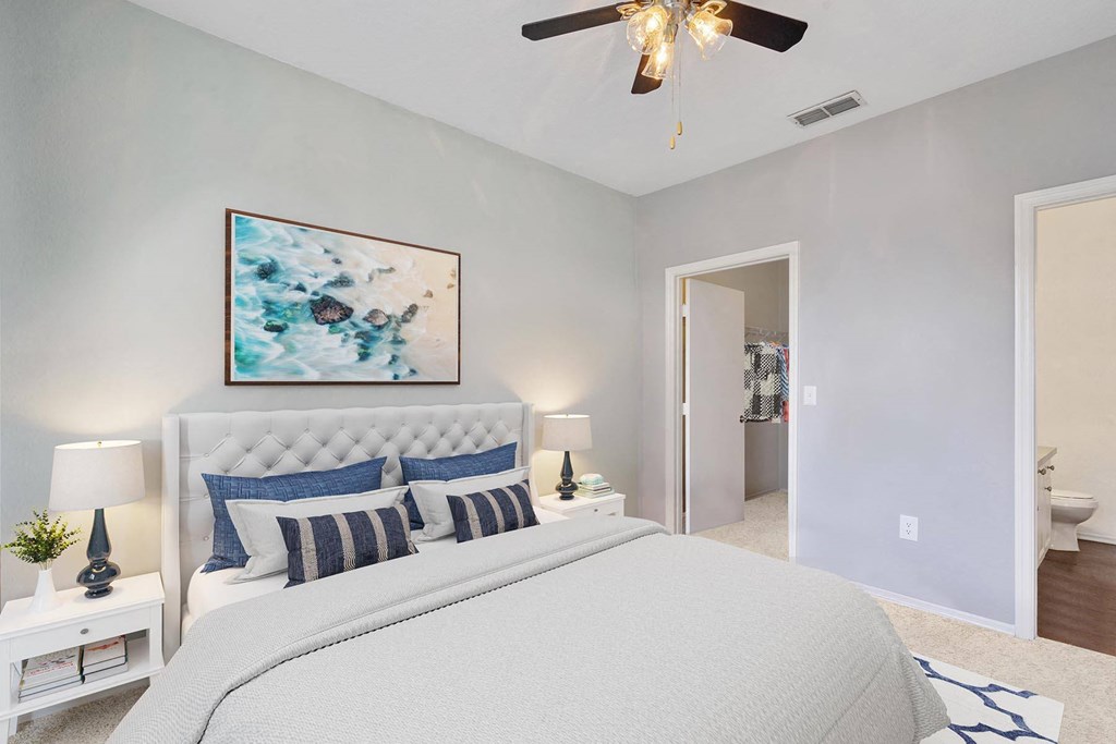 a bedroom with a bed and a ceiling fan at Bella Vista on Park, Plant City, FL