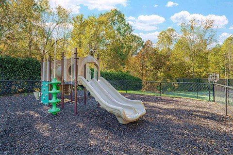 Playground at a park with a slide at Thornberry Apartments, Charlotte, 28262