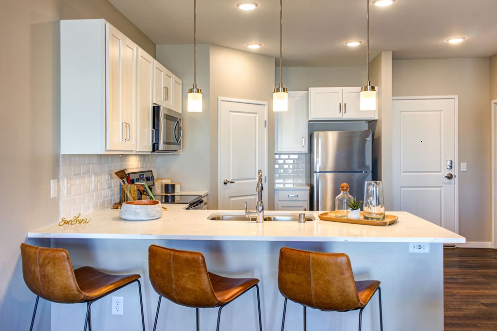 Kitchen with pendant lightingat SoRoc On Maine, Rochester, MN 55904 