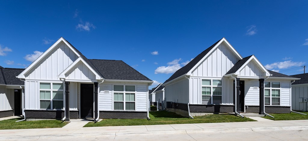 Two identical houses are side by side.