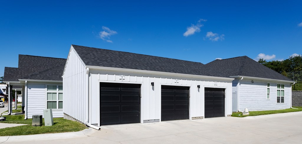A two-car garage is attached to a house.