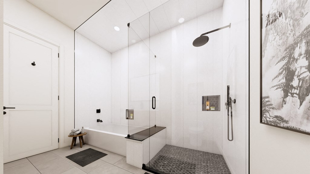 a large white bathroom with a shower and a tub