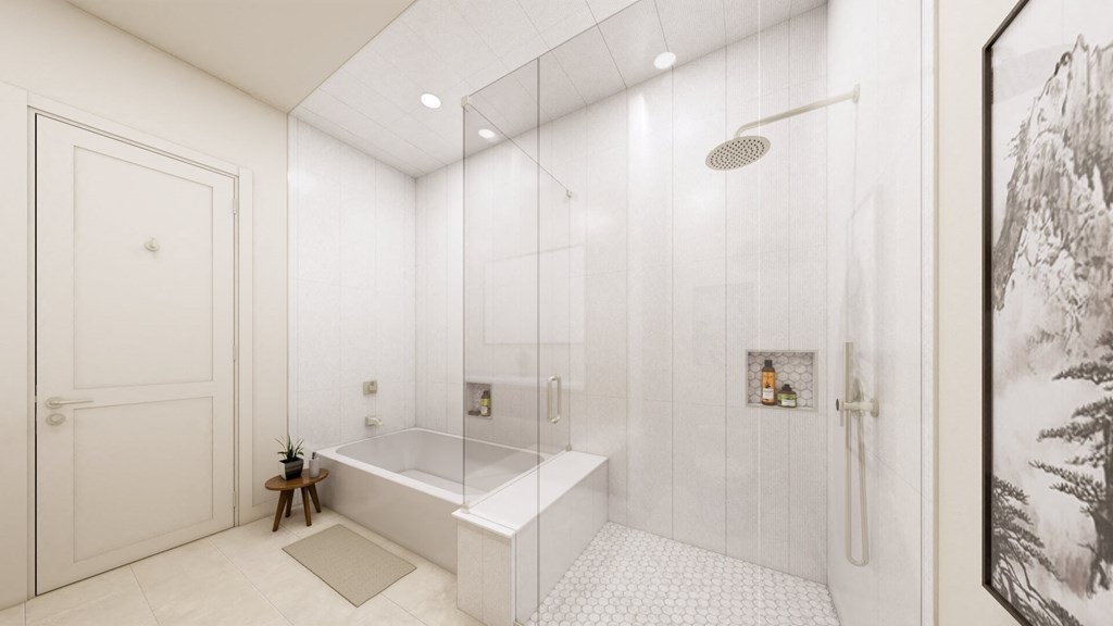 a large white bathroom with a shower and a tub