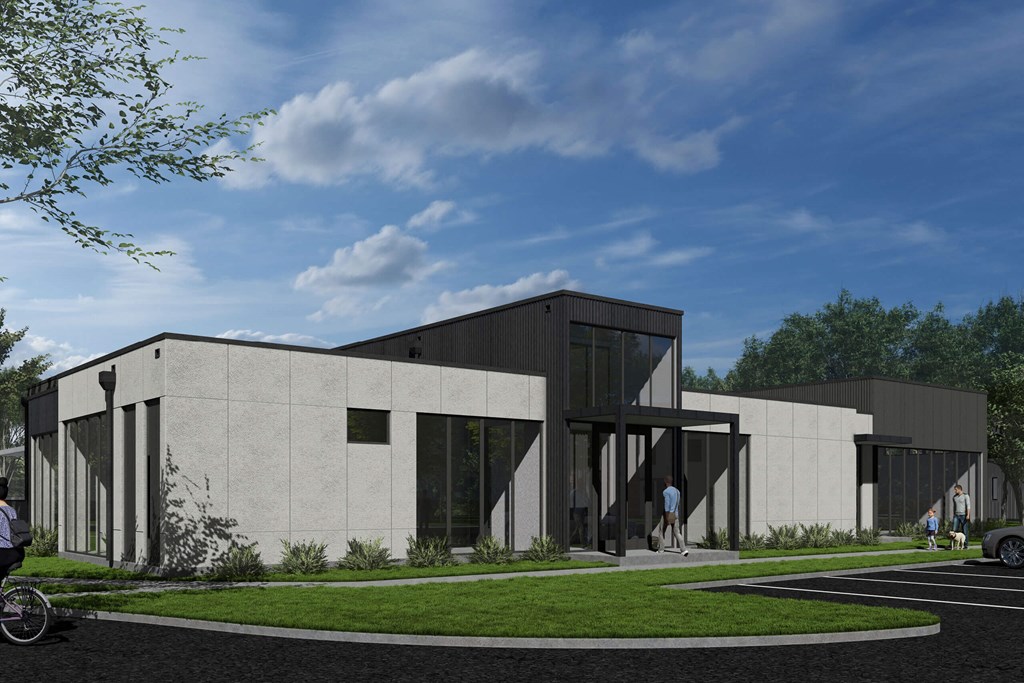 a rendering of a concrete building with a lawn and a sidewalk