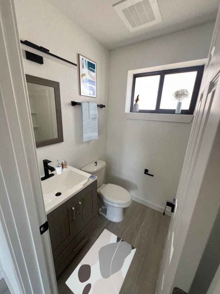 a small bathroom with a toilet and a sink