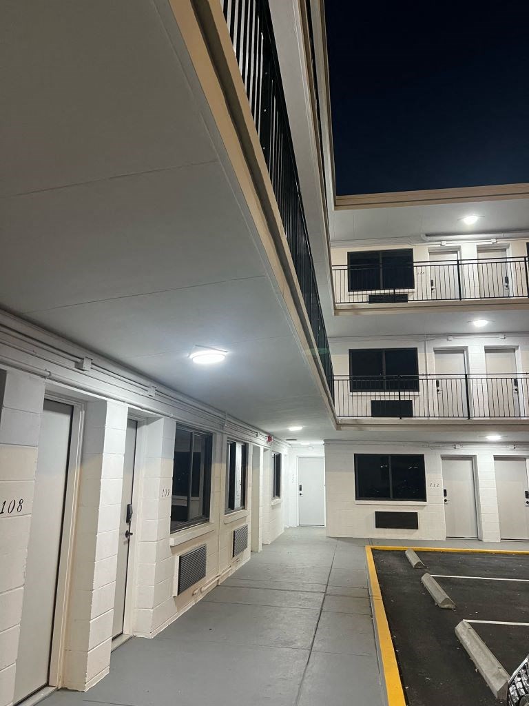 an empty parking lot in a building at night