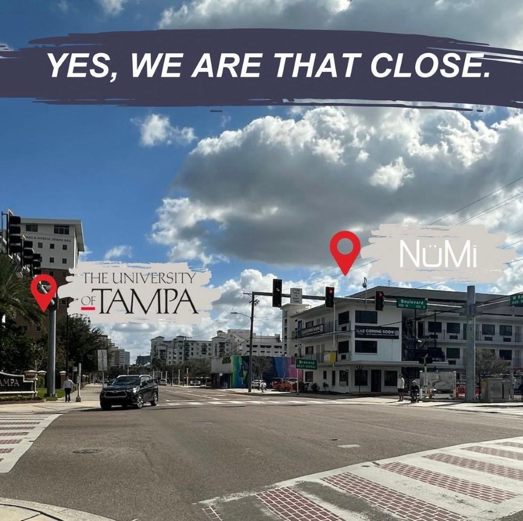 a city street with a sign that says yes we are that close