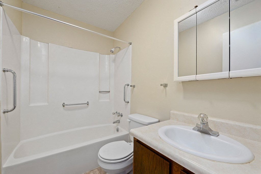the preserve at ballantyne commons apartment bathroom with sink toilet and shower