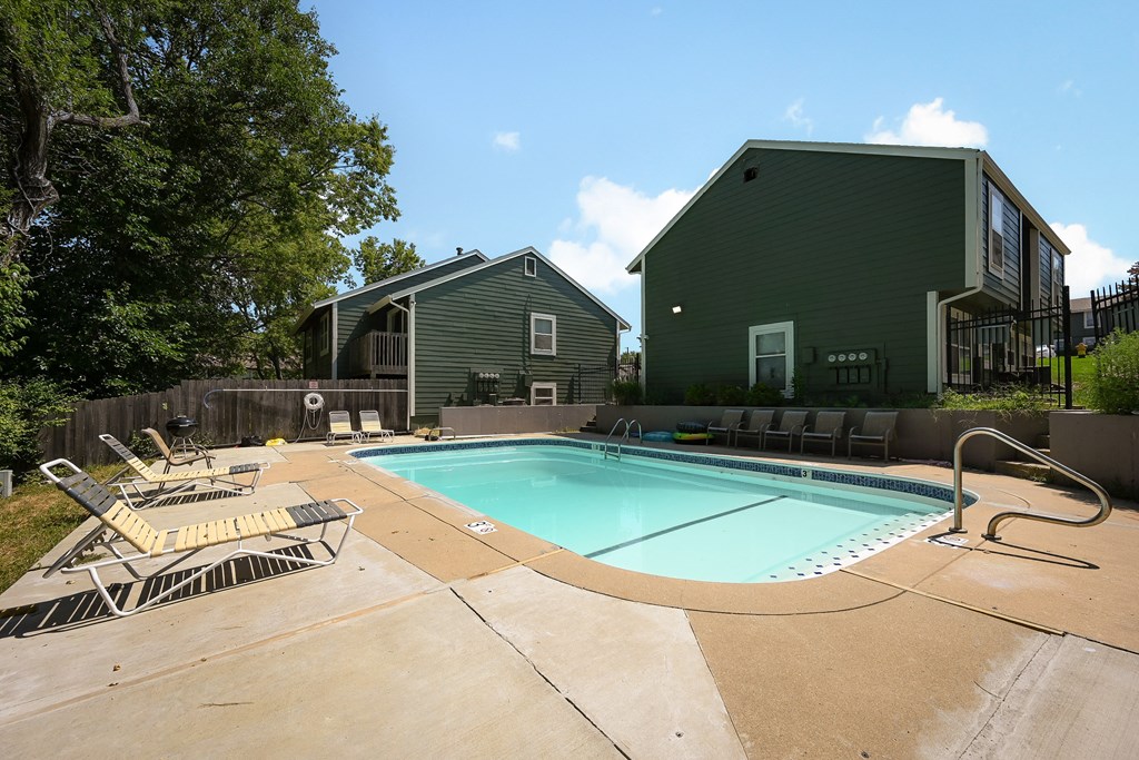 our resort style swimming pool is in front of our house and is next to two