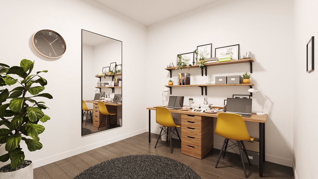 a home office with a mirror and a desk with a laptop