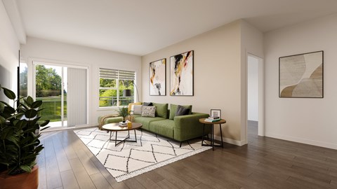 a living room with a green couch and a rug