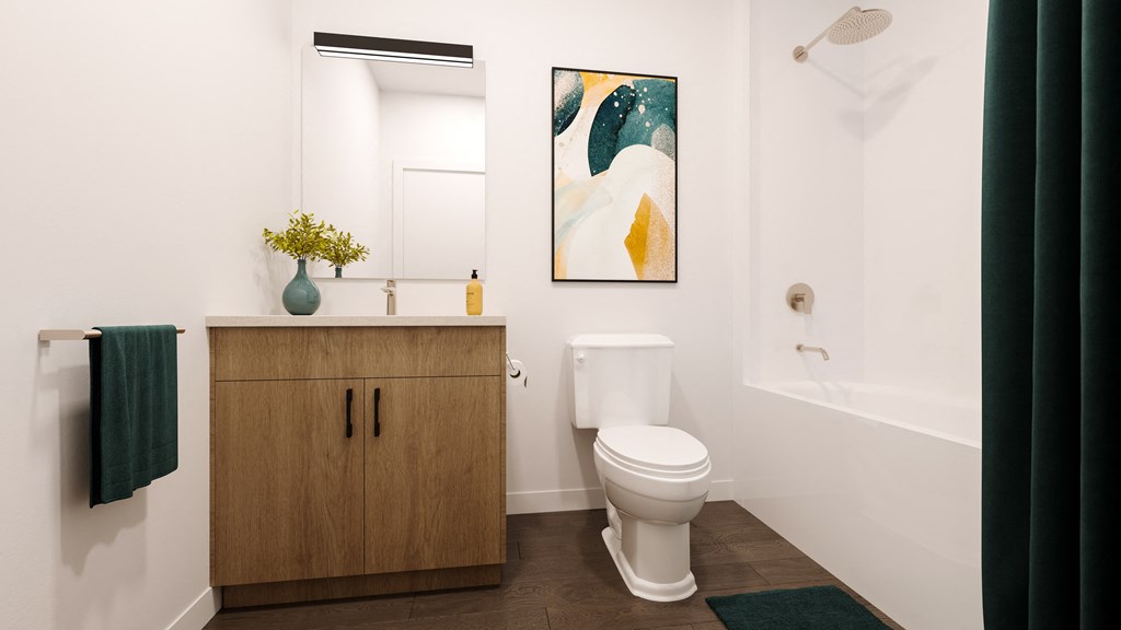 a bathroom with a toilet and a sink and a shower