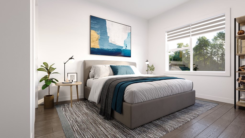 an image of a bedroom with a bed and a window