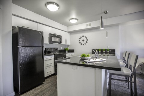 Interior - wide shot of kitchen.