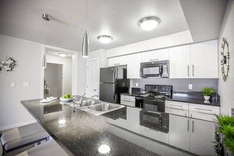 Interior - wide shot of kitchen.
