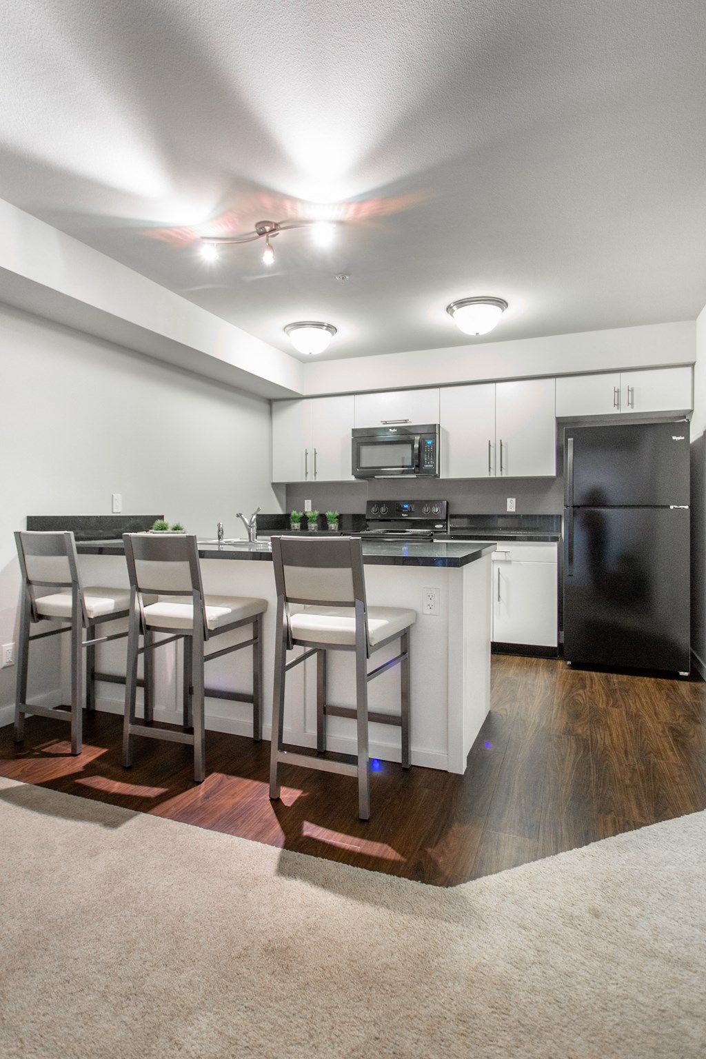 Interior - wide shot of kitchen.
